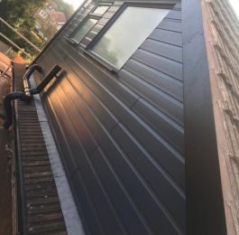 Anthracite grey UPVC cladded flat roof dormer.: Click Here To View Larger Image