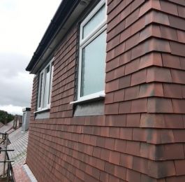 Flat roof dormer with clay plain hanging tiles.: Click Here To View Larger Image