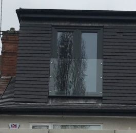 Anthracite grey UPVC French doors with glass balustrade.: Click Here To View Larger Image