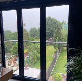 Loft conversion with aluminium bi-folding doors.: Click Here To View Larger Image